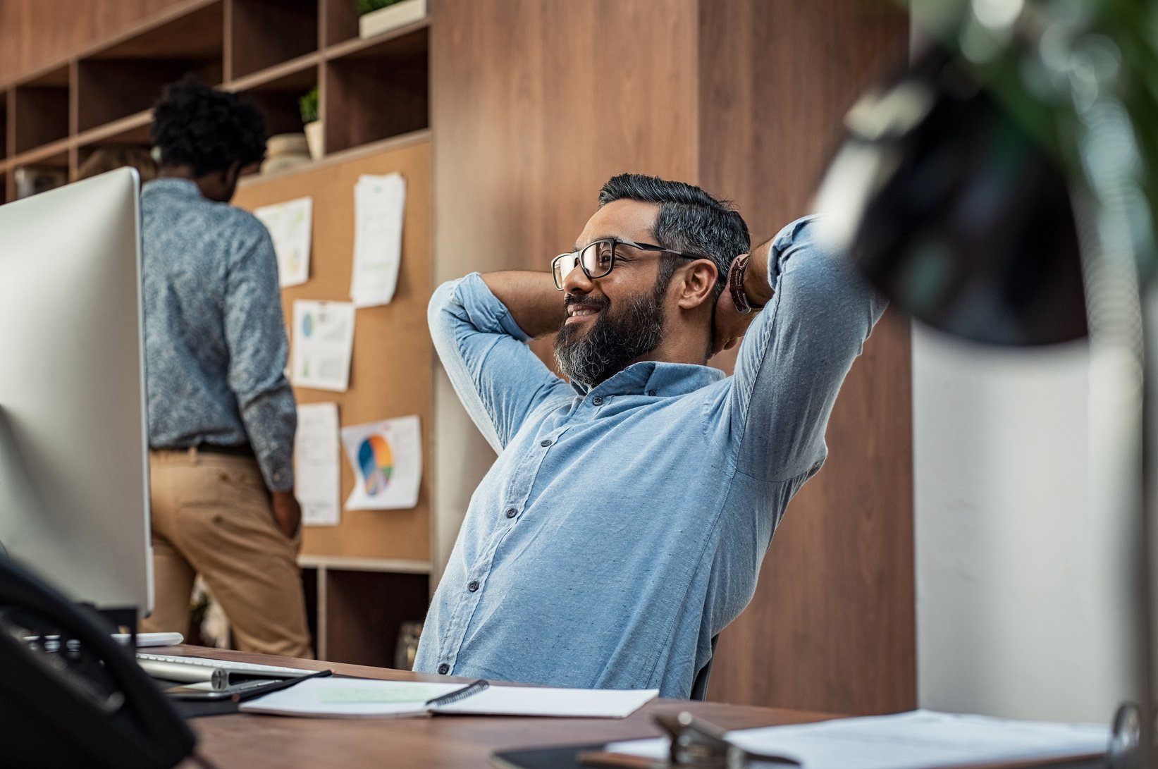 Mature Business Man Relaxing at Work